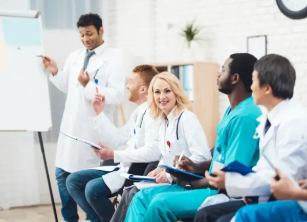 indian-doctor-stands-near-blackboard-explains-something-4-1024x683